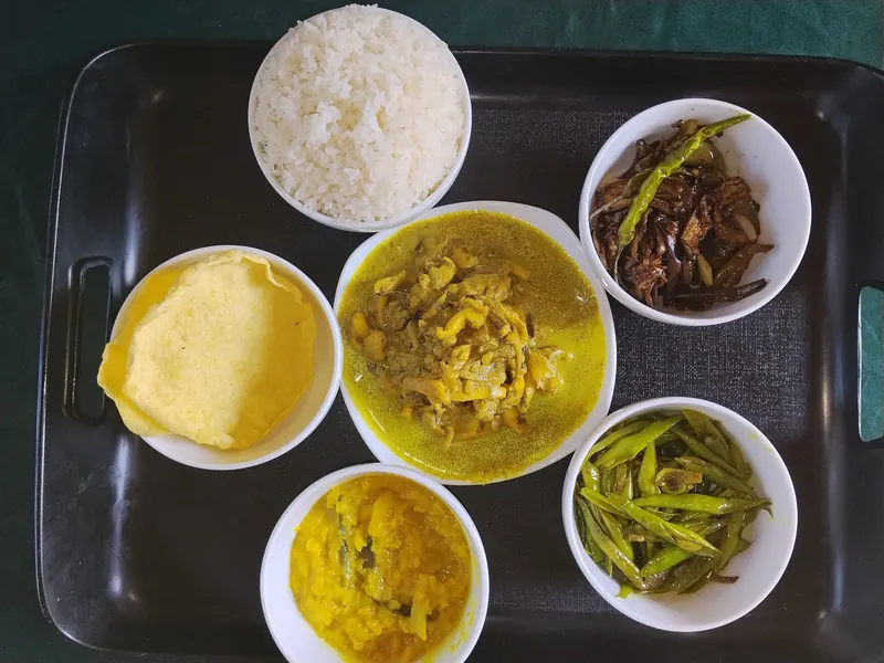 Cuttlefish curry rice set with dhal, beans and brinjal
