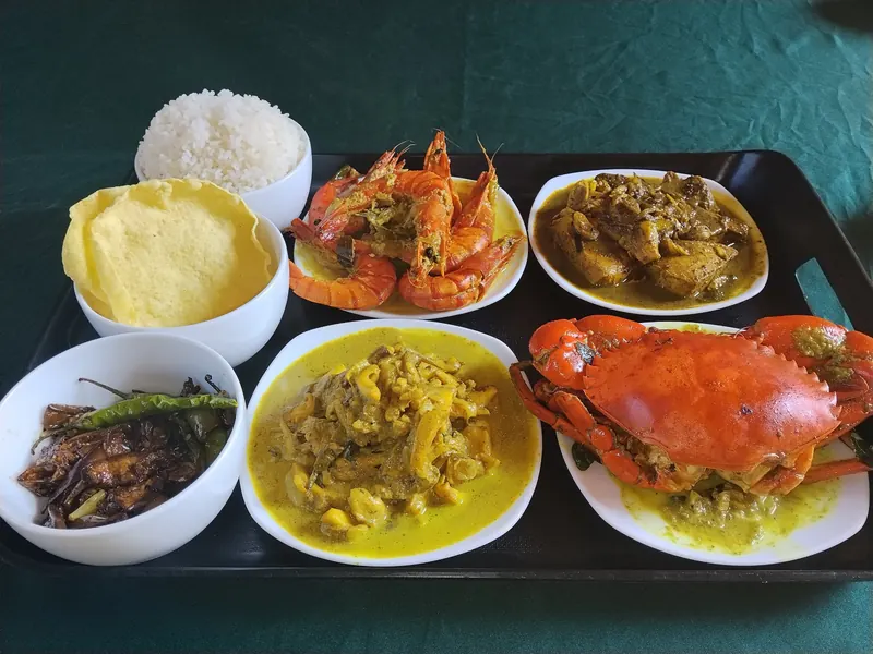 Seafood rice and curry spread with crab, prawns and cuttlefish in Nilaveli
