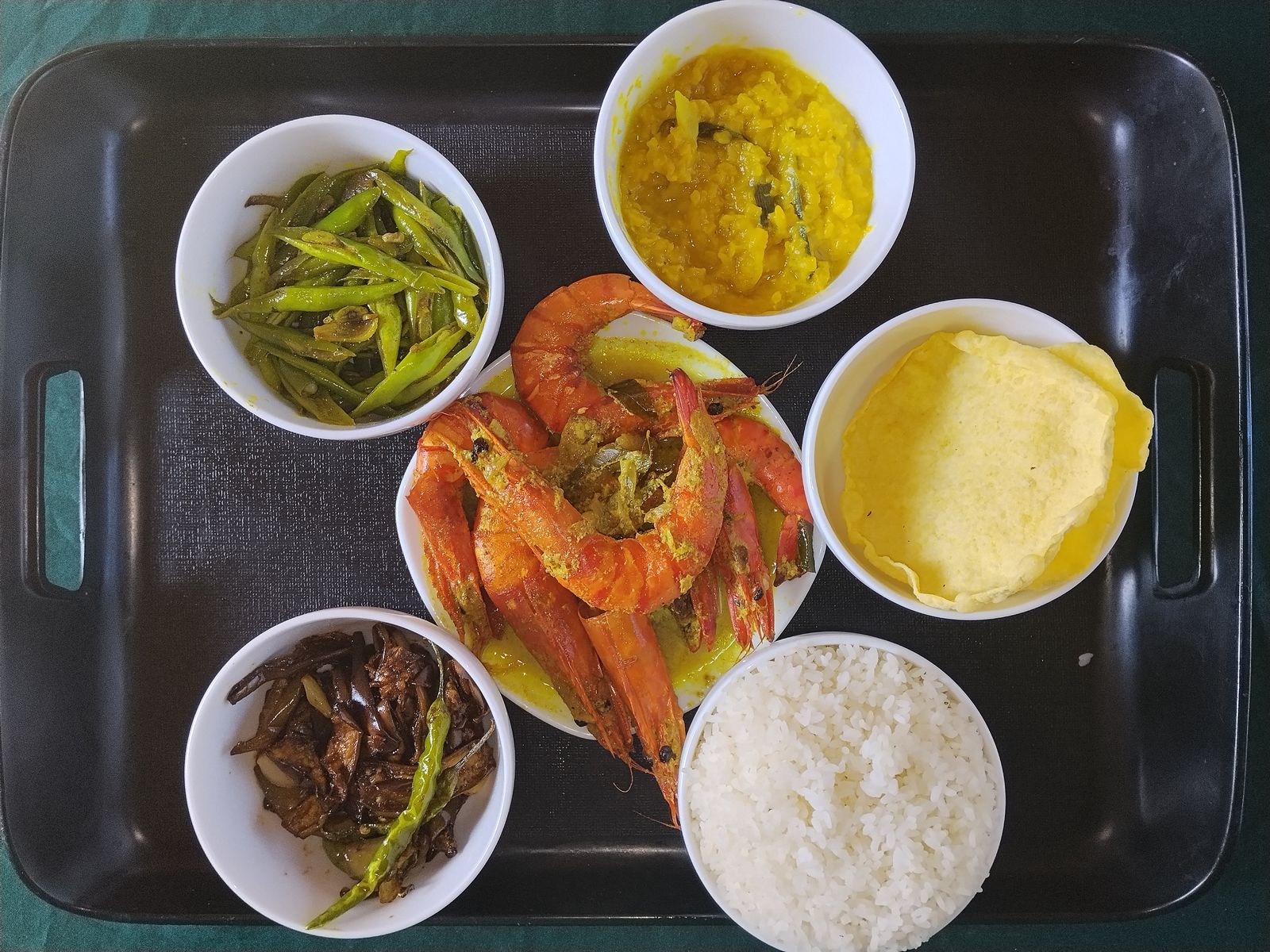 Tiger prawn curry with rice, dhal and papadam in Nilaveli