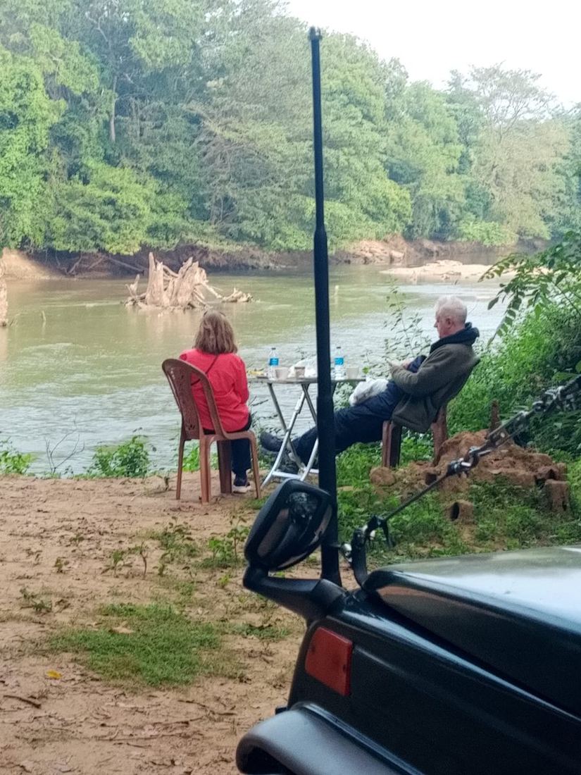 Guests having riverside refreshments on the bank of the Walawe river during a full day safari